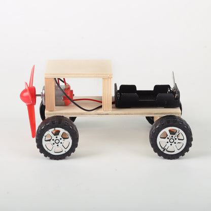 Wooden wind-powered car kit components for assembly